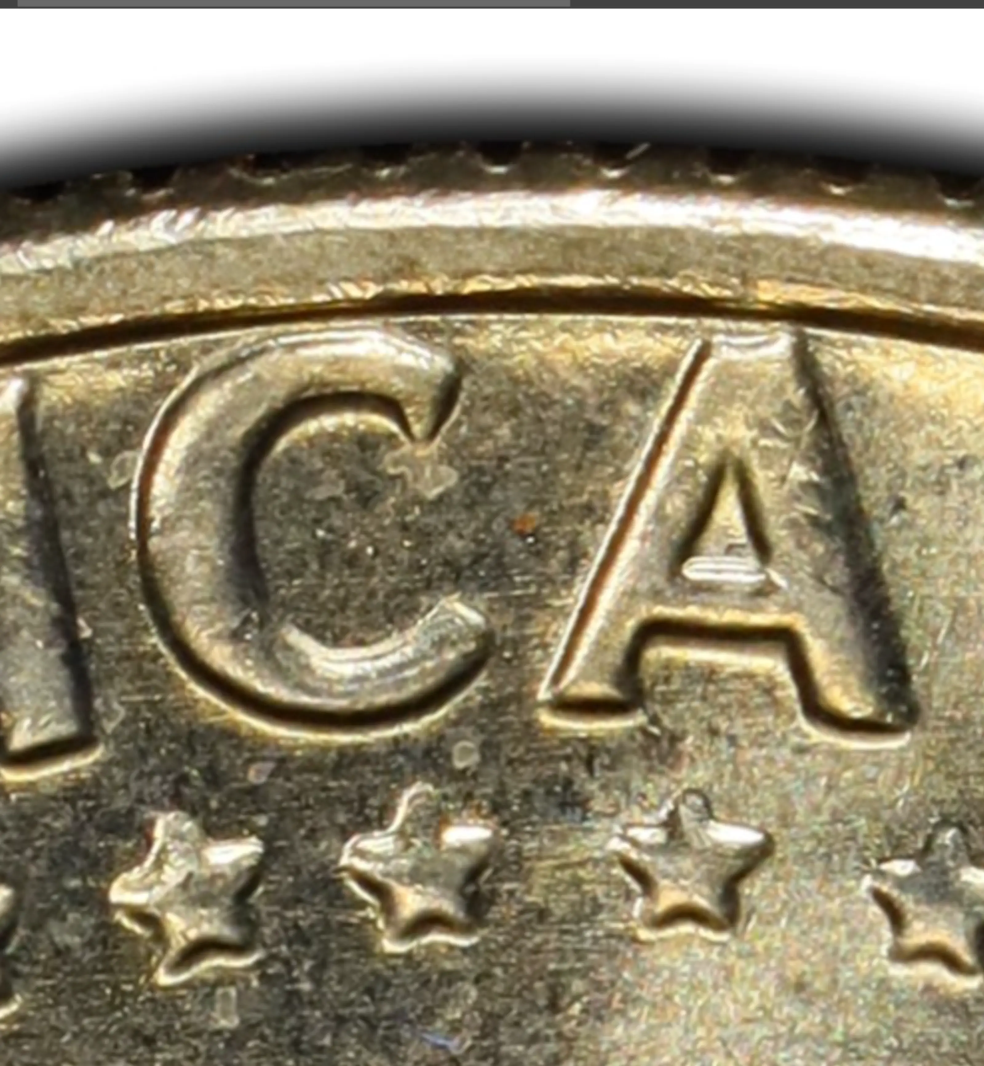 1977-D-Kennedy-Half-Dollar-Reverse-Lettering