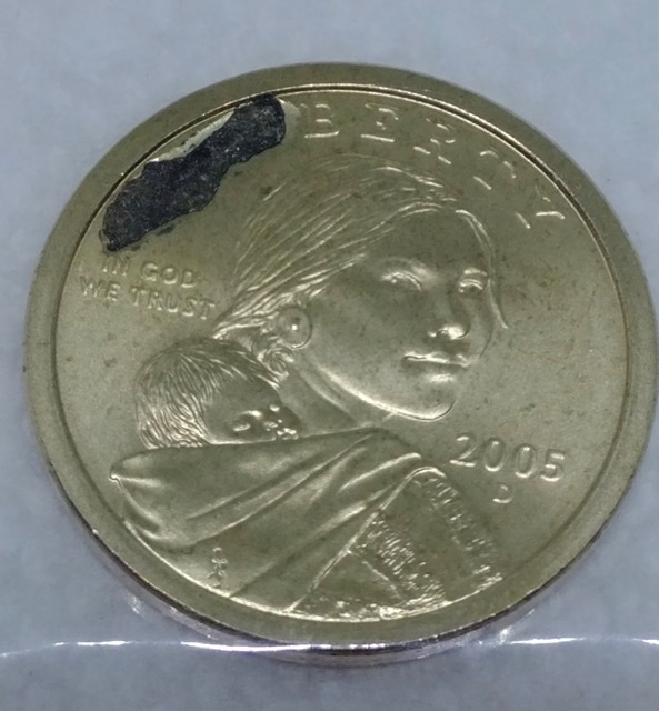 Struck-Thru-2005-Sacajawea-Dollar