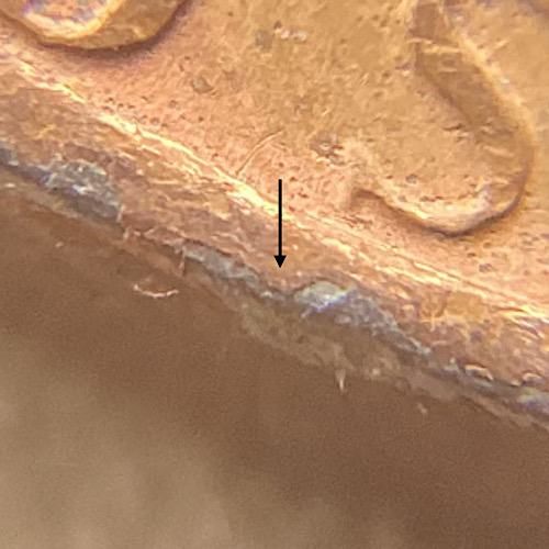 1977-Nickel-With-Large-Flaking-Copper-Patches.