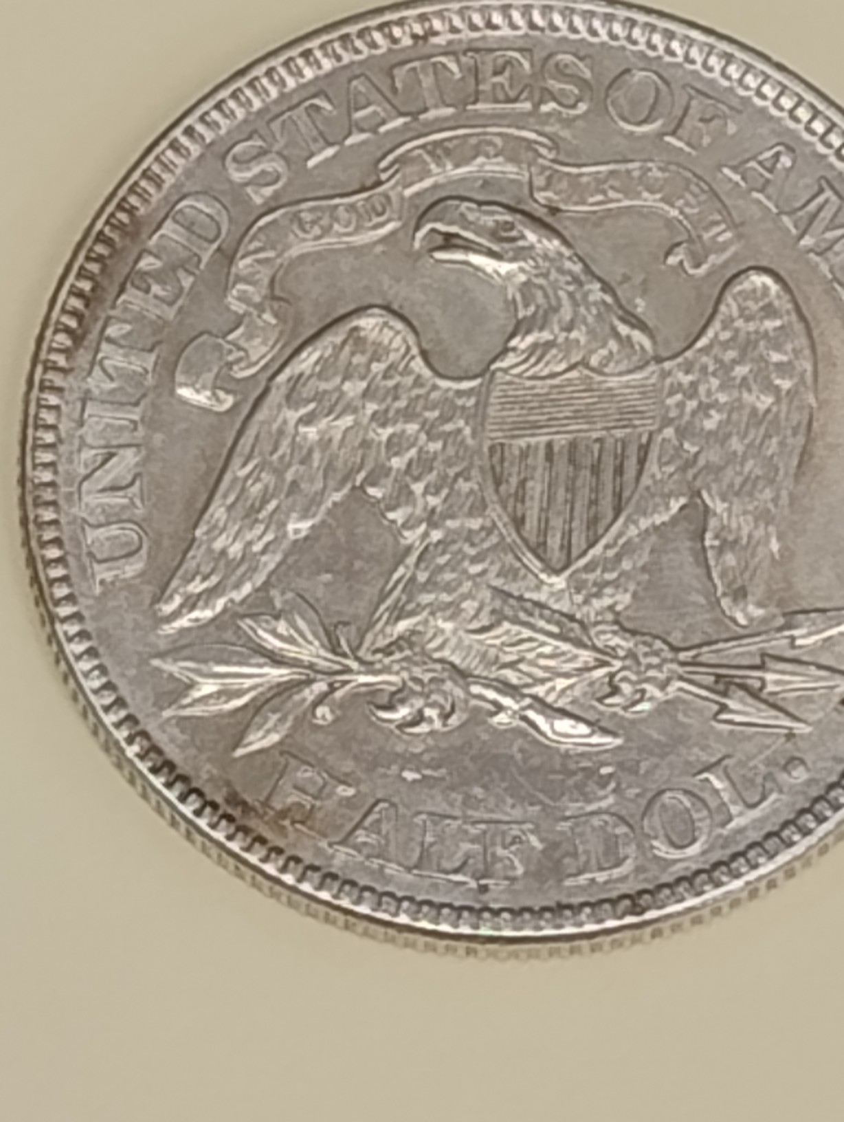1869-P-Seated-Half-Dollar-At-'Legitimate'-Coin-Shop