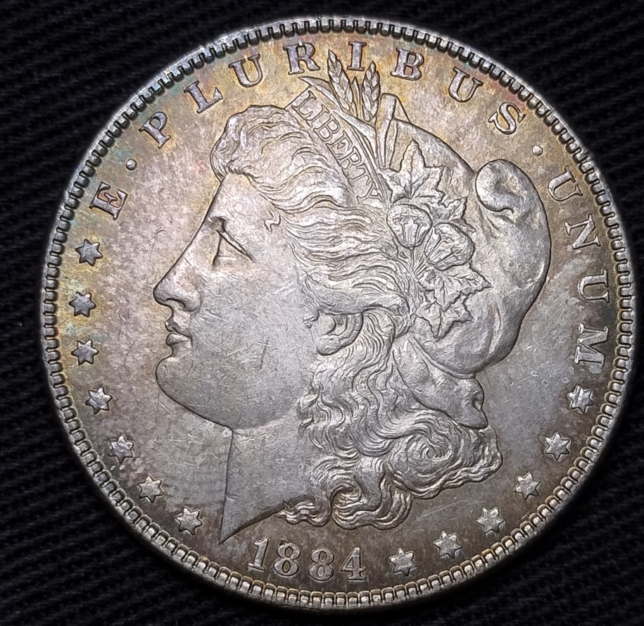 1884-Morgan-Dollar-Decent-Toning-;-Worth-Grading?