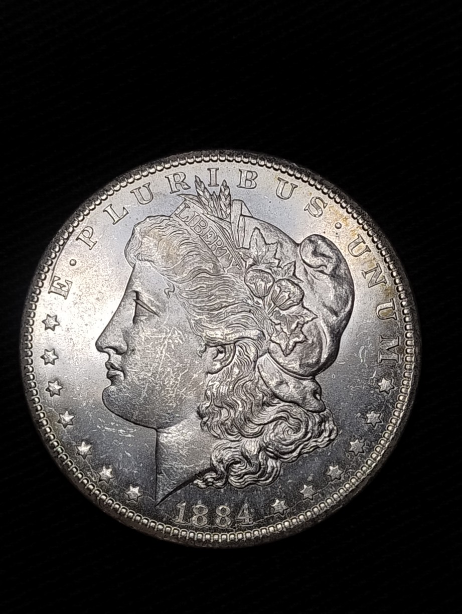 1884-CC-Morgan-Dollar-;-Worth-Grading-?