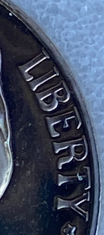 1969-S-Proof-Nickel---Heavy-Thickening-At-The-Base-Of-The-Type-Variety,-Damage-Or-An-Error?