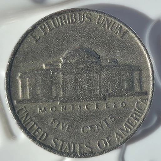 1957-Nickel-Die-Chip-On-Obverse