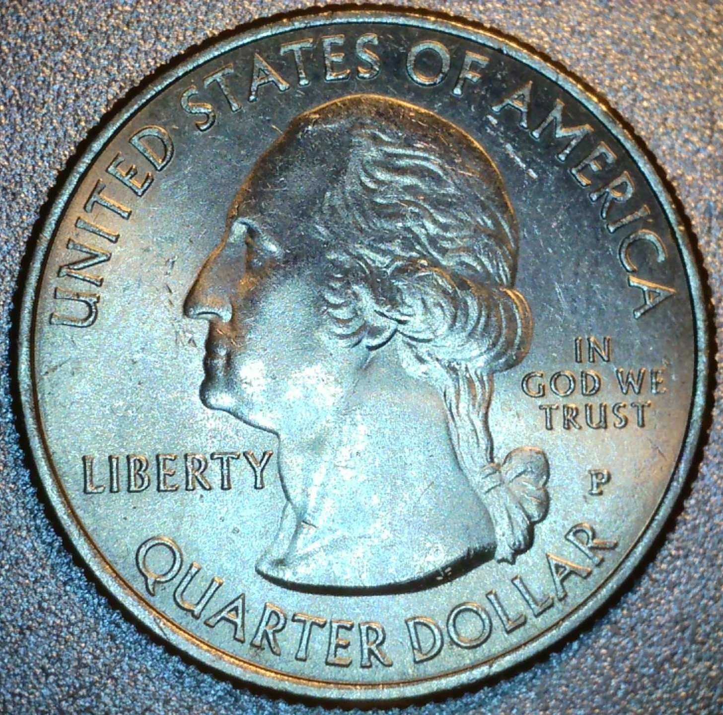 2020-Land-Sterwardship-Quarter-With-Die-Chips-And-Doubling-On-The-Thumb