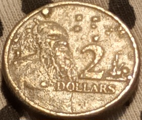 2006-$2-Coin-With-'Blobs'-Of-Metal