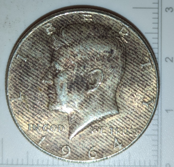 1964-Half-Dollar-With-Many-Parallel-Stripes