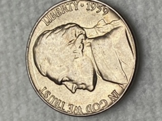 Roll-Hunting-And-Found-A-Keeper.-1959-Nickel
