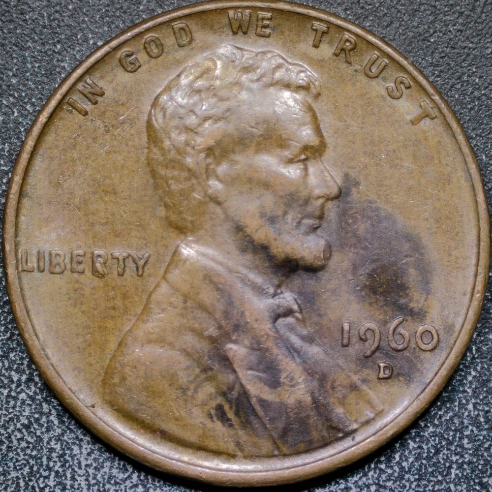 A-Couple-Of-Die-Chips-On-Cents-1957-D-&-1960-D