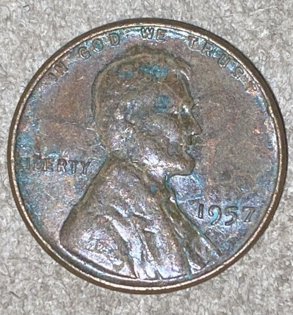 1957-D-Penny-With-Something-Going-On-With-Liberty