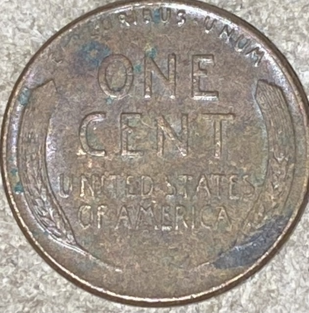 1957-D-Penny-With-Something-Going-On-With-Liberty