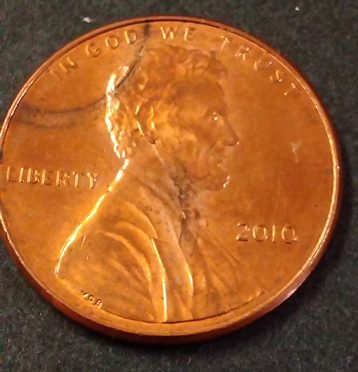 Possible-Obverse-Incomplete-Clip-On-Lsp-With-Damage-On-Reverse.-2010-Cent