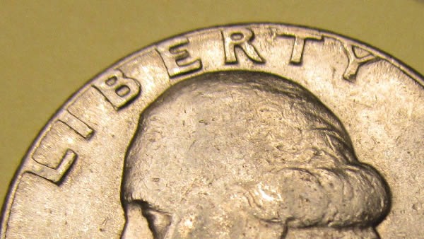Is-This-Machine-Doubling?-1985-And-1982-Quarter.