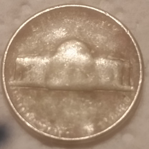 1984-Nickel--Struck-Through-Grease-Or-PMD?