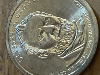 1-Dollar-Gold-Coin-With-Real-Looking-Eyes-2011