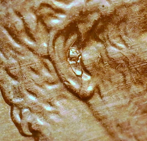 1991-LMC-Penny-/-Spiked-Head-With-Earplug-Retained-Interior-Die-Break