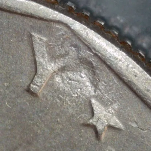1979-D-SBA-Dollar-/-Struck-Through-Grease