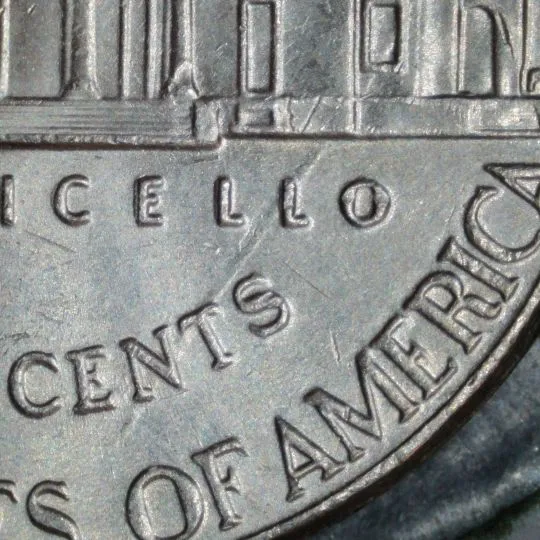 2023-P-Nickel-With-Long-Die-Dent.