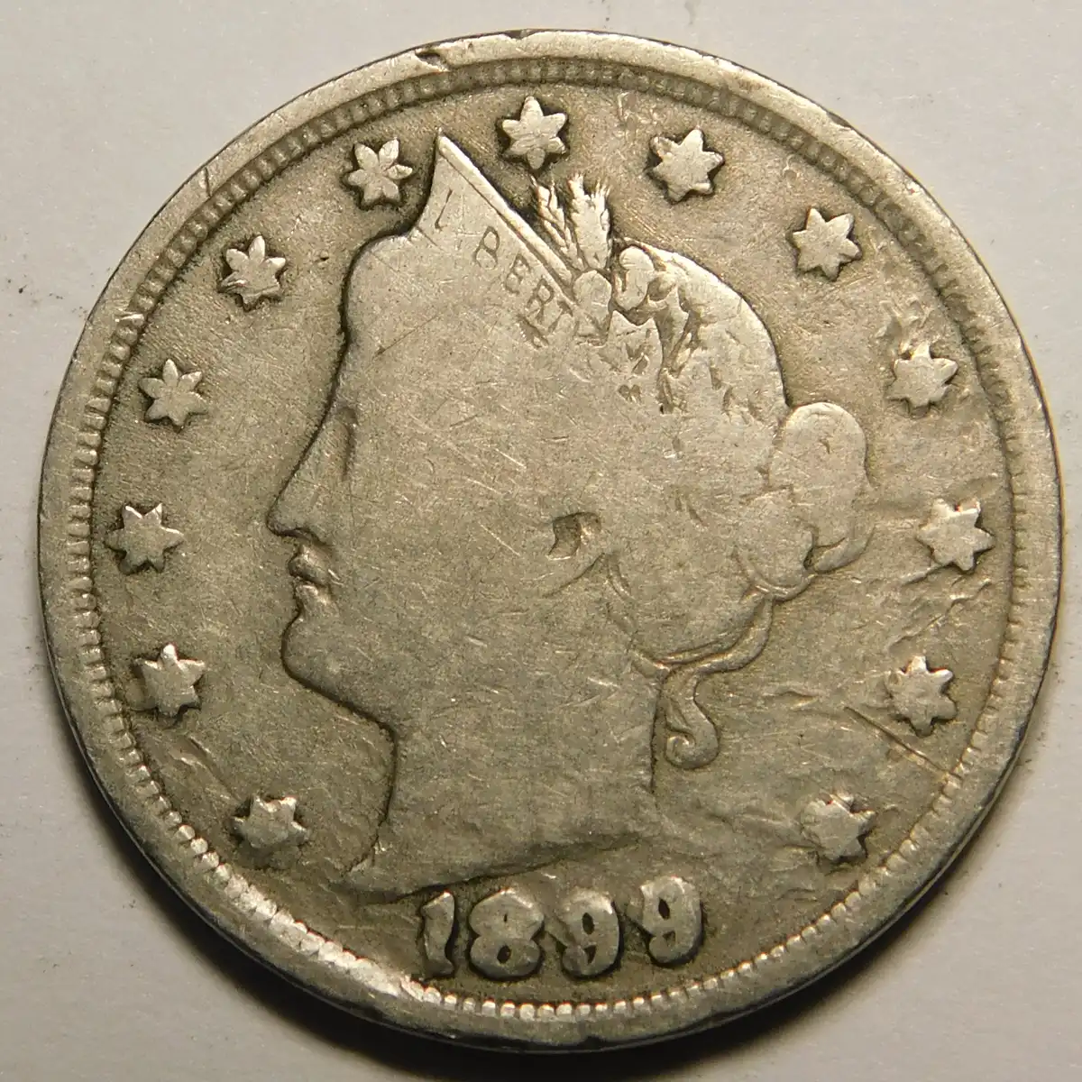 1899-Liberty-Nickel,-Struck-Thru-Or-Just-Damage?