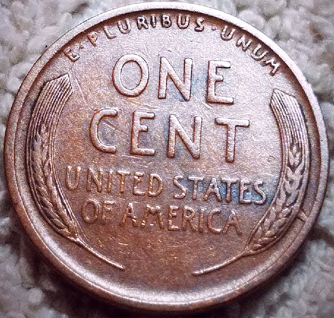 1909-Lincoln-Cent-With-A-Raised-Metal-Bridge-Connecting-Wheat-To-Rim