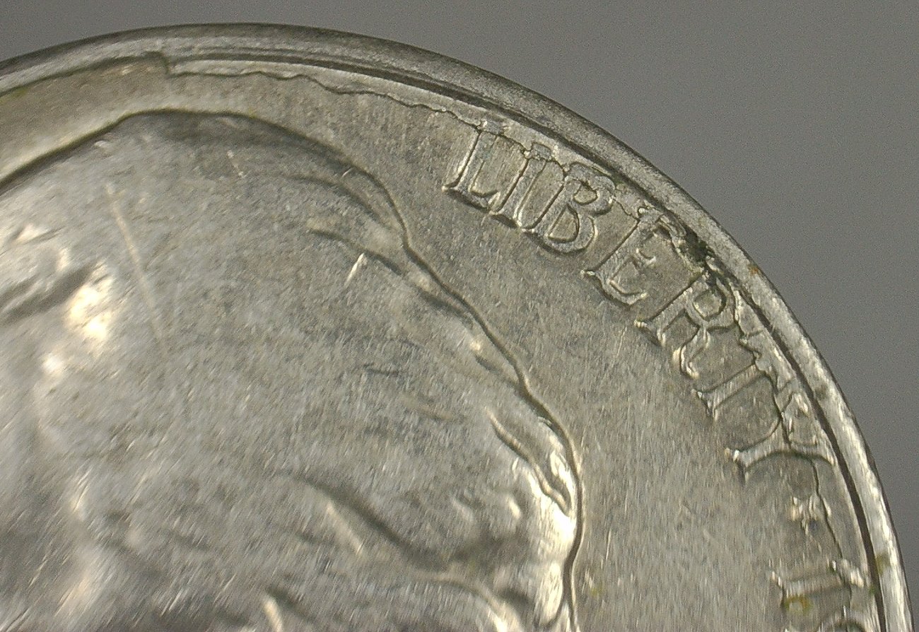 1964-D-Nickel-Delamination-Crack