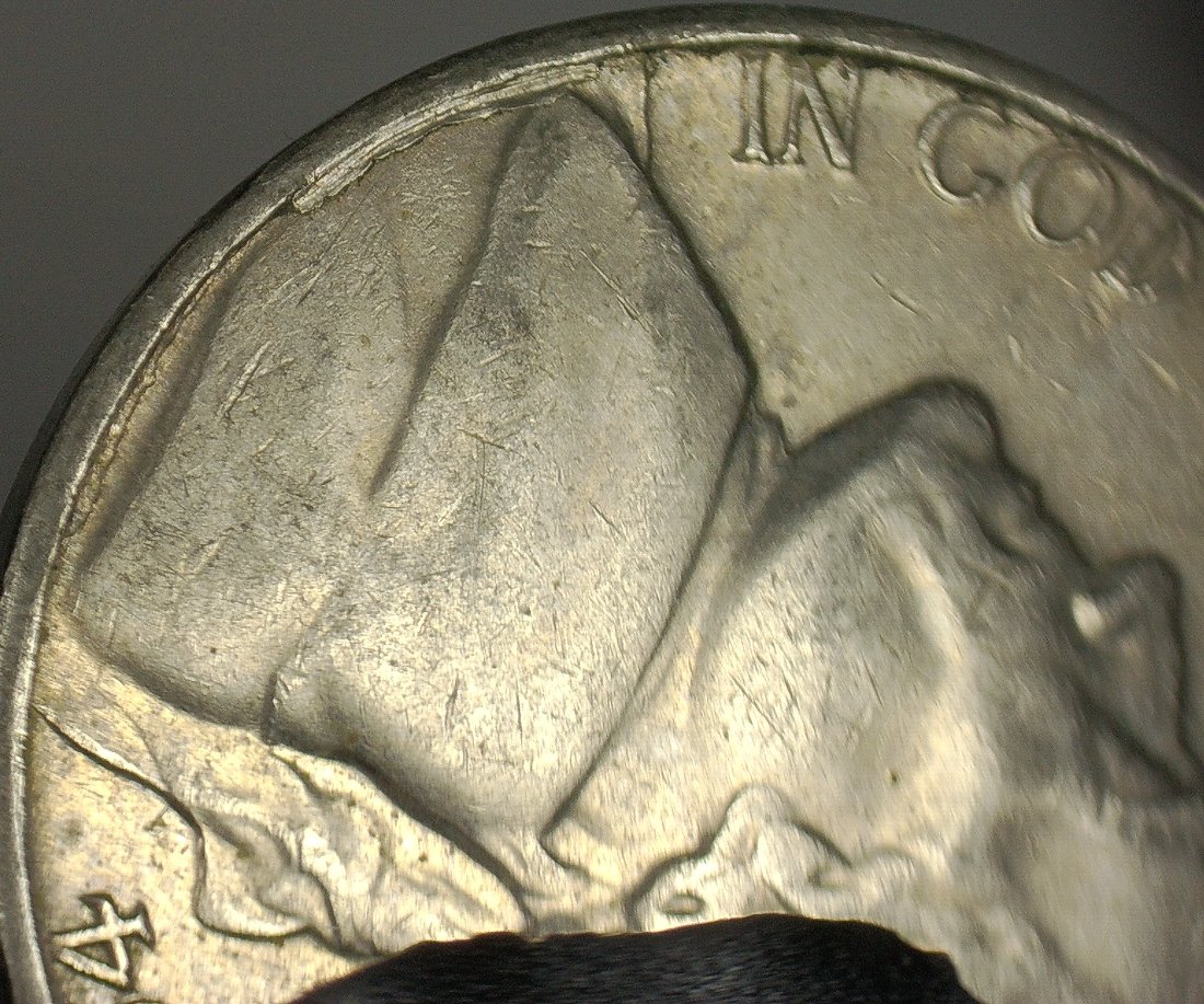 1964-D-Nickel-Delamination-Crack