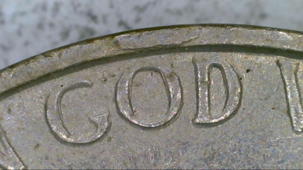 Does-This-1964-Nickel-Have-Doubling-On-The-Front-'God'-And-'Monticello'-On-The-Back?