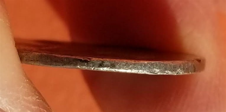 Strange-1984-Quarter