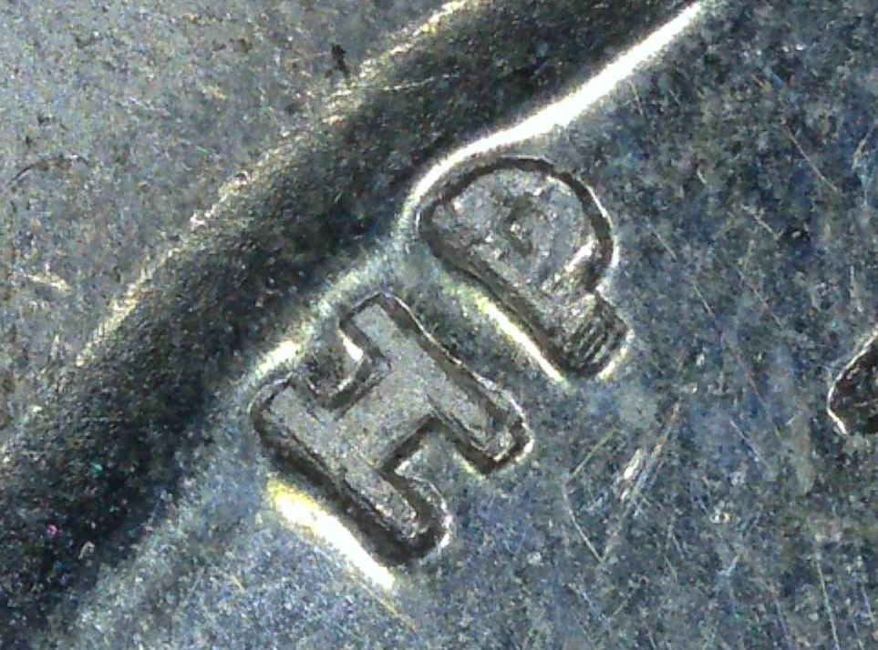 1951-Canadian-Dollar---Triple-Or-Quadruple-Hp?