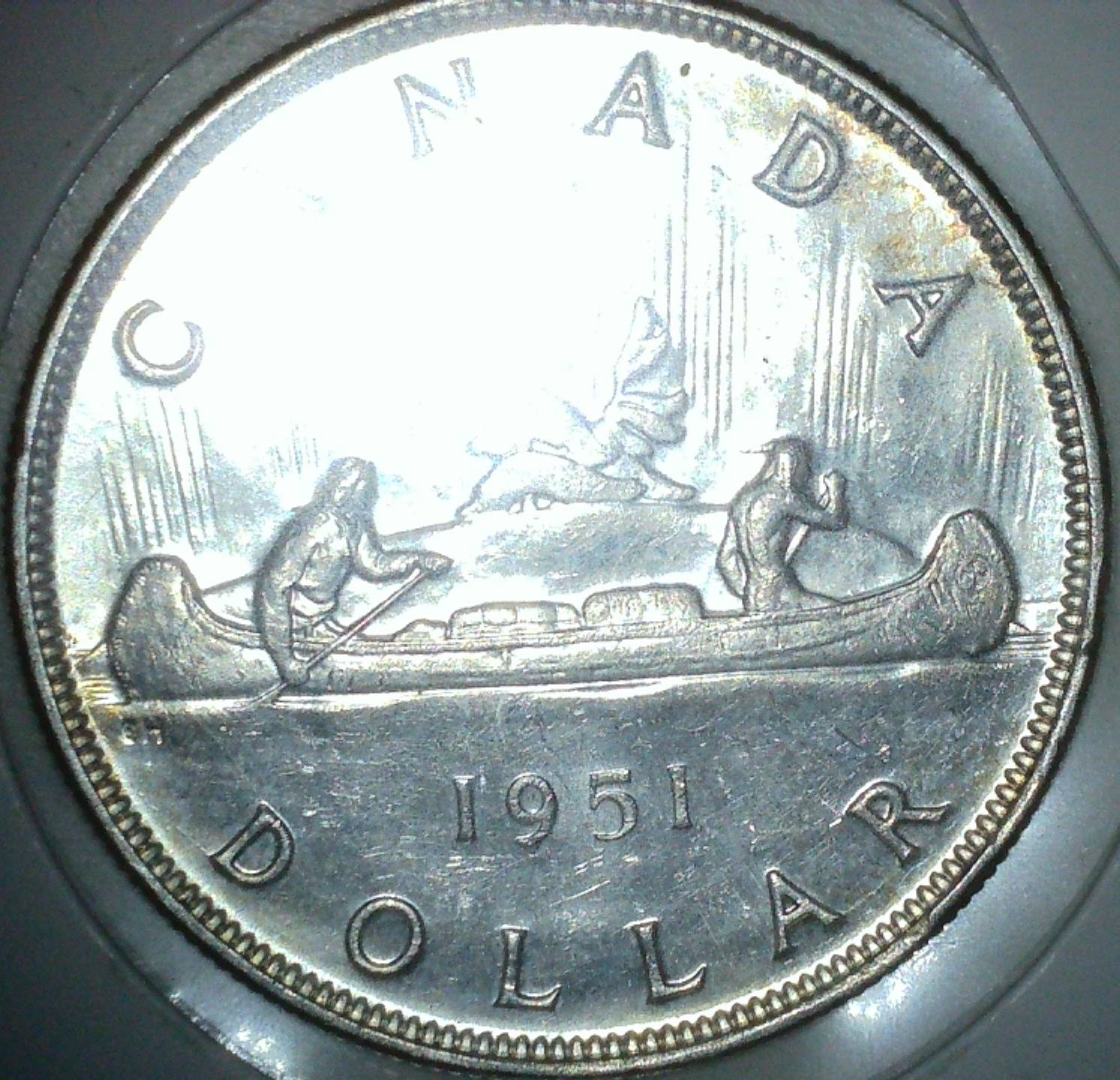1951-Canadian-Dollar---Triple-Or-Quadruple-Hp?