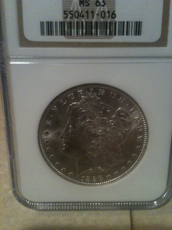 Need-Help.--Wondering-If-I-Got-A-Fake-Graded-Coin