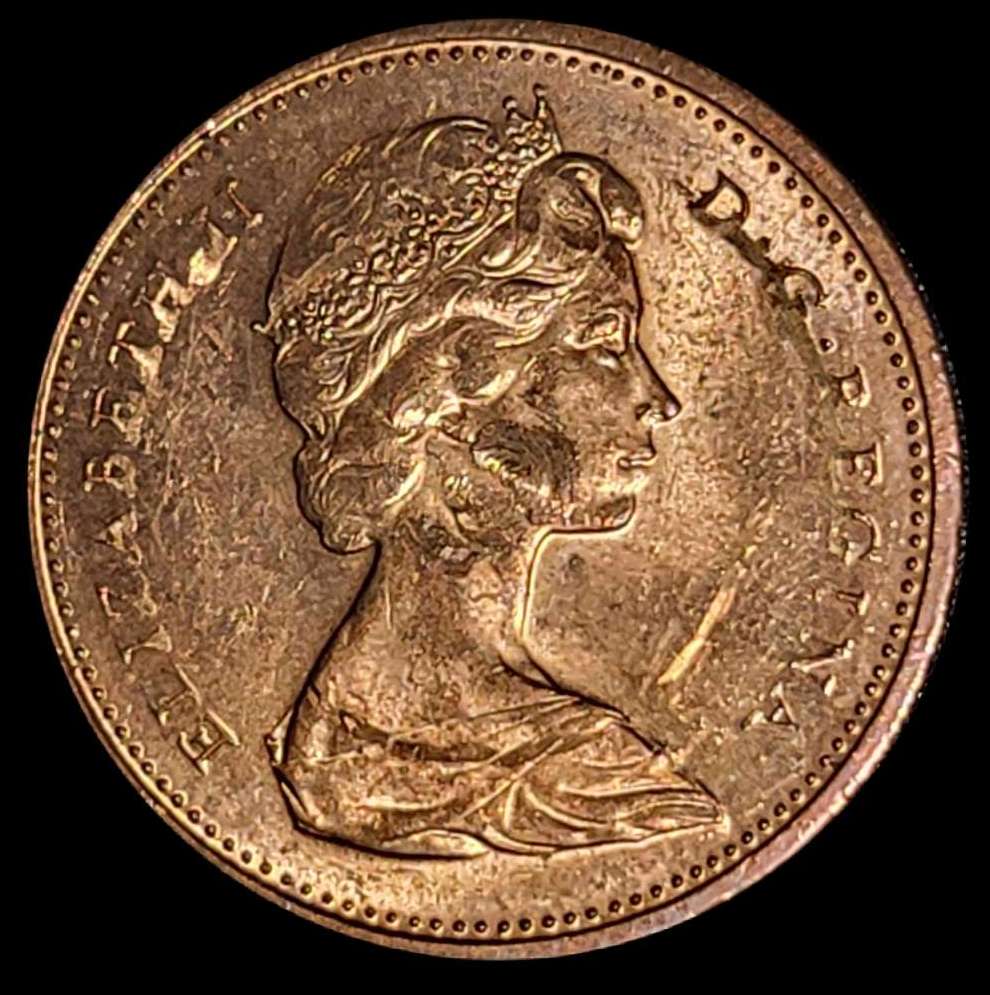 1967-Commemorative-Penny.-Odd-Features-On-Face