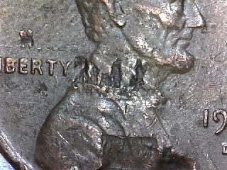 Is-It-Struck-Through-Or-Lamination-Or-Both.-1974-D-LMC