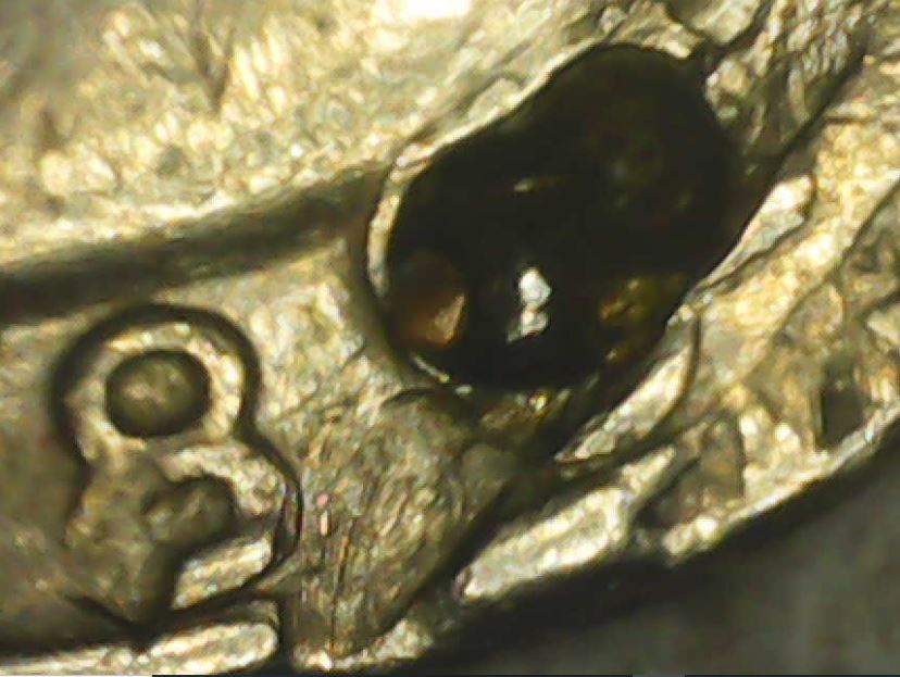 1988-D-Quarter-Error-Or-Damage?