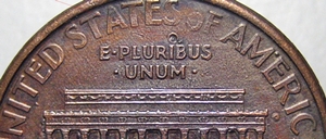 Penny-With-Interesting-Spots,-Other-Coins
