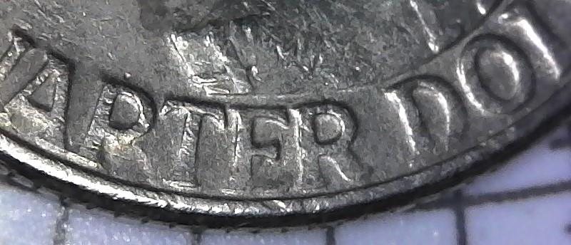 Bicentennial-Quarter-Missing-Part-Of-Letter