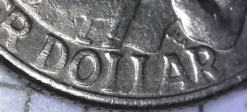 Bicentennial-Quarter-Missing-Part-Of-Letter