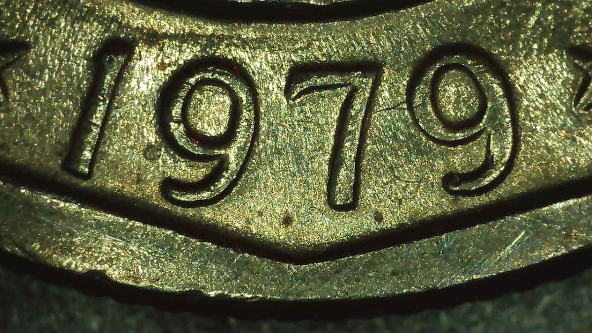 1979-P-SBA-Dollar-With-Wide-Rim