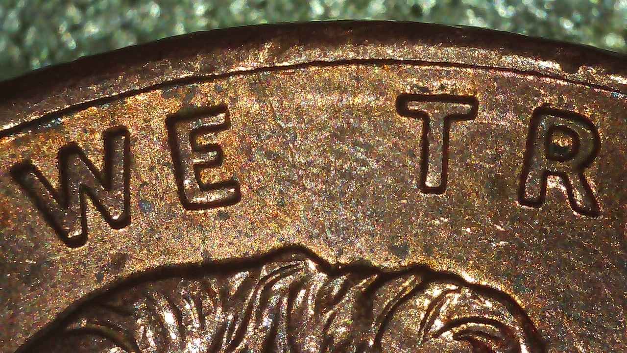 1995-Penny-With-Trifecta-Bie,-Spike-Head-&-Nice-Die-Crack
