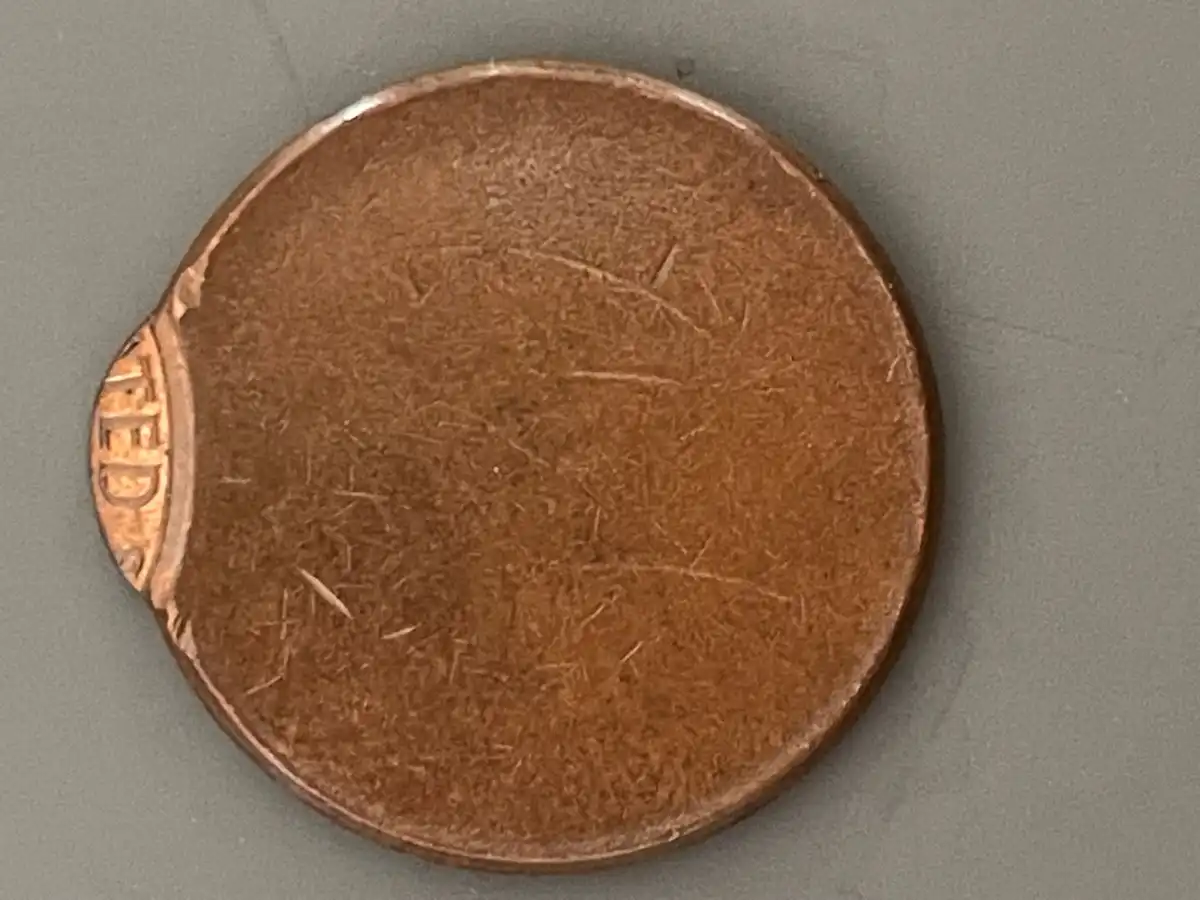 Penny---No-Date---90+%-Off-Center-Strike