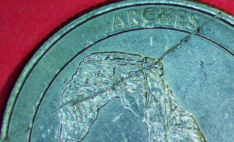 2014-D-Quarter-With--Struck-Thu-With-Wire