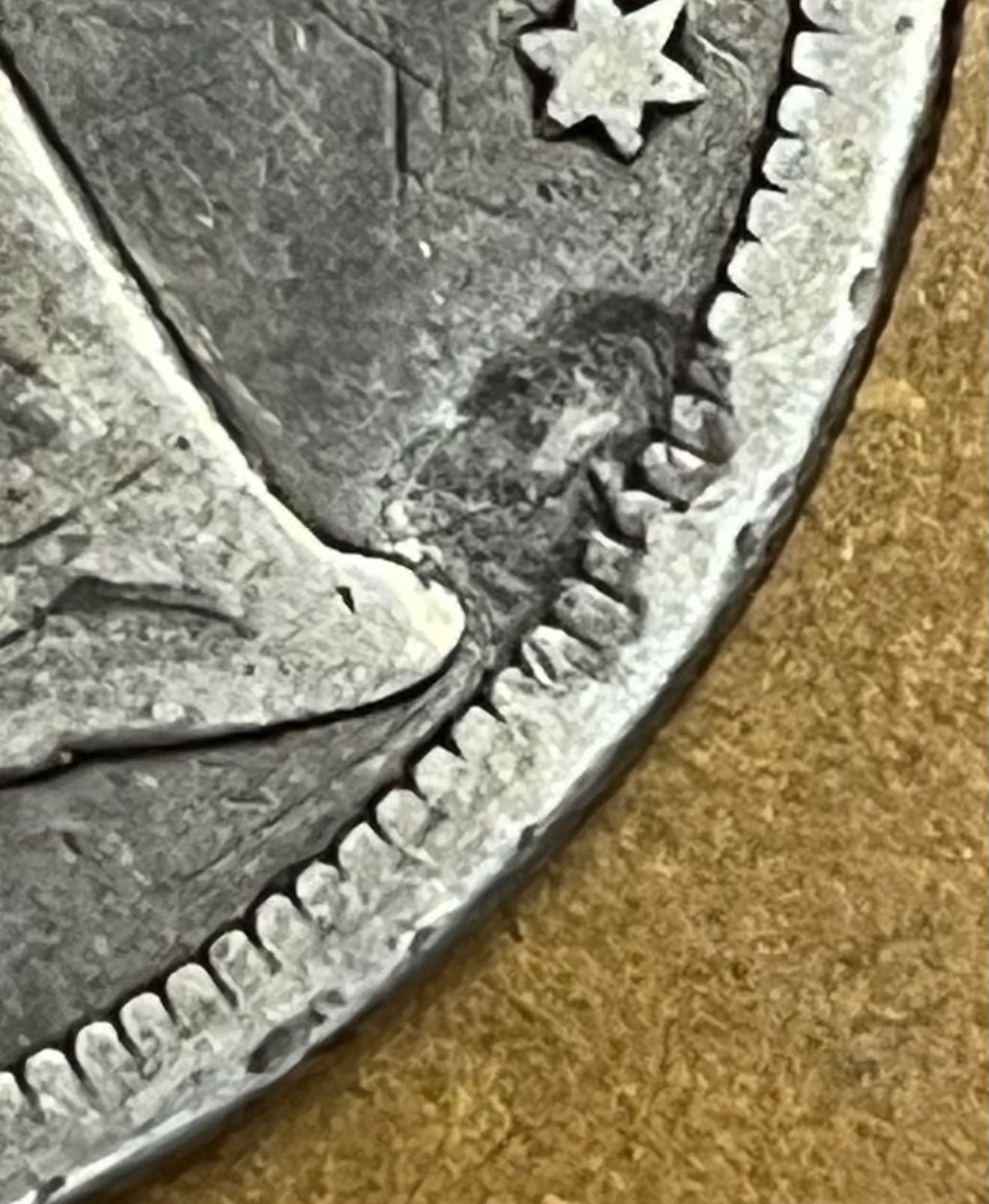 What-Caused-This-Flaw-1860-Seated-Dollar?