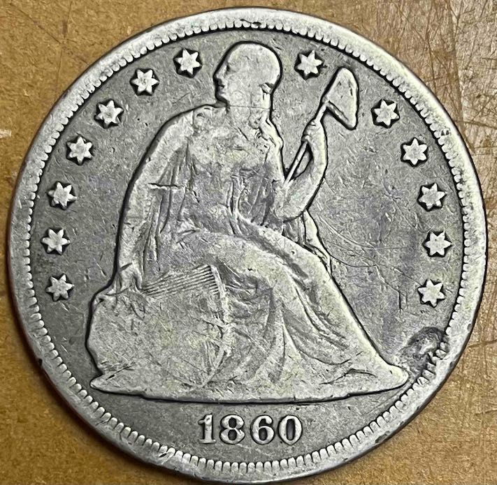What-Caused-This-Flaw-1860-Seated-Dollar?
