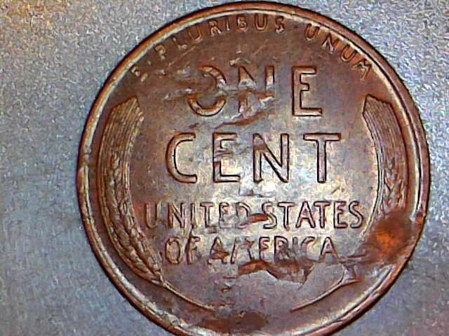 1957-D-Bie,-Plus-Struck-Thru-Debris,-Plus-Lamination,-Plus-Struck-Thru?