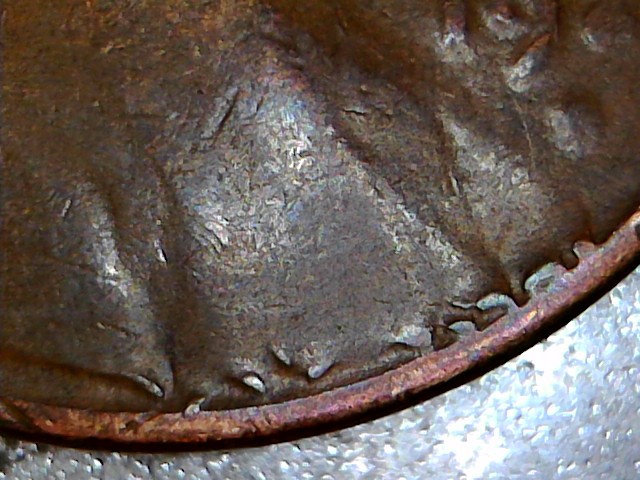 1925-D-Wheat-Penny-With-Unexplained-On-Bottom-Of-Obverse