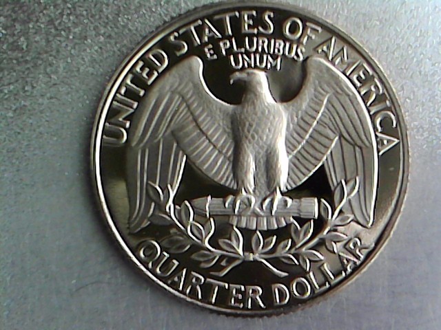 1992-Proof-Quarter-With-Partial-Dropped-Letter?