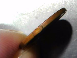 1937-Lincoln-Wheat-Cent-With-Bump-On-The-Rim.