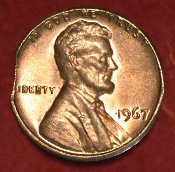 Is-This-1967-Lincoln-Cent-Just-Clipped?-Or-Is-There-More-To-It?