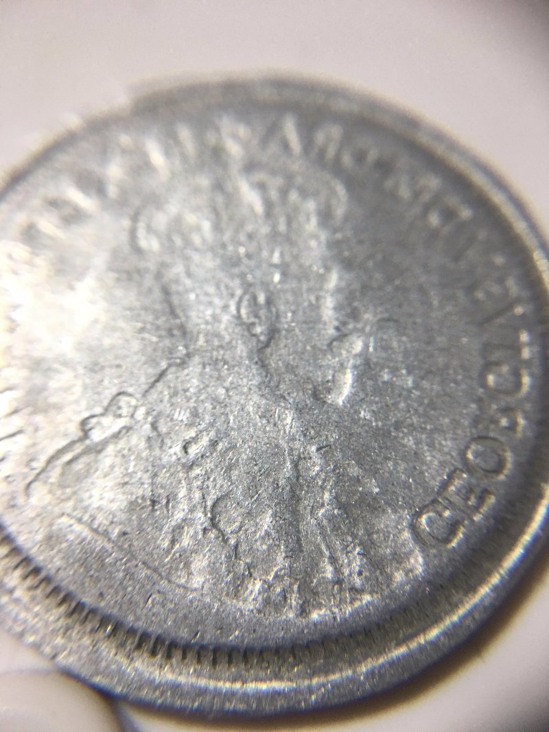 Any-Idea-What-This-Could-Be?-Canadian-25c-Recessed/Reversed-
