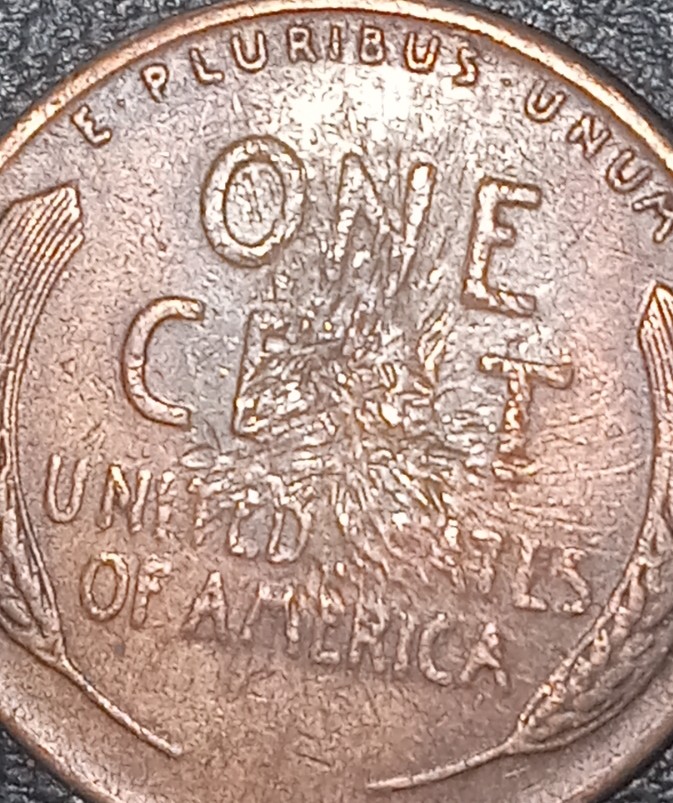 1955-D-Wheat-Penny-Looks-Like-Something-During-Mint-N-Some-After-Huh?